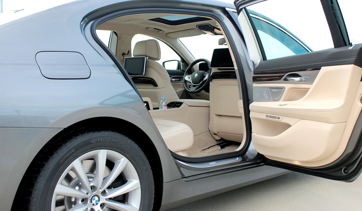 BMW 750iL xDrive 03 Limousine with open door.