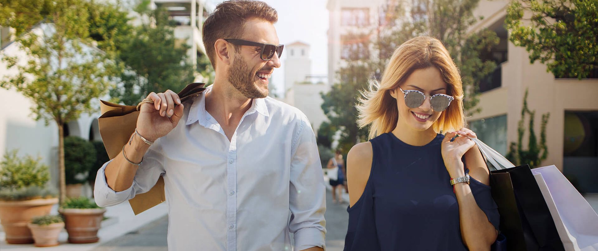 A couple with shopping-bags.