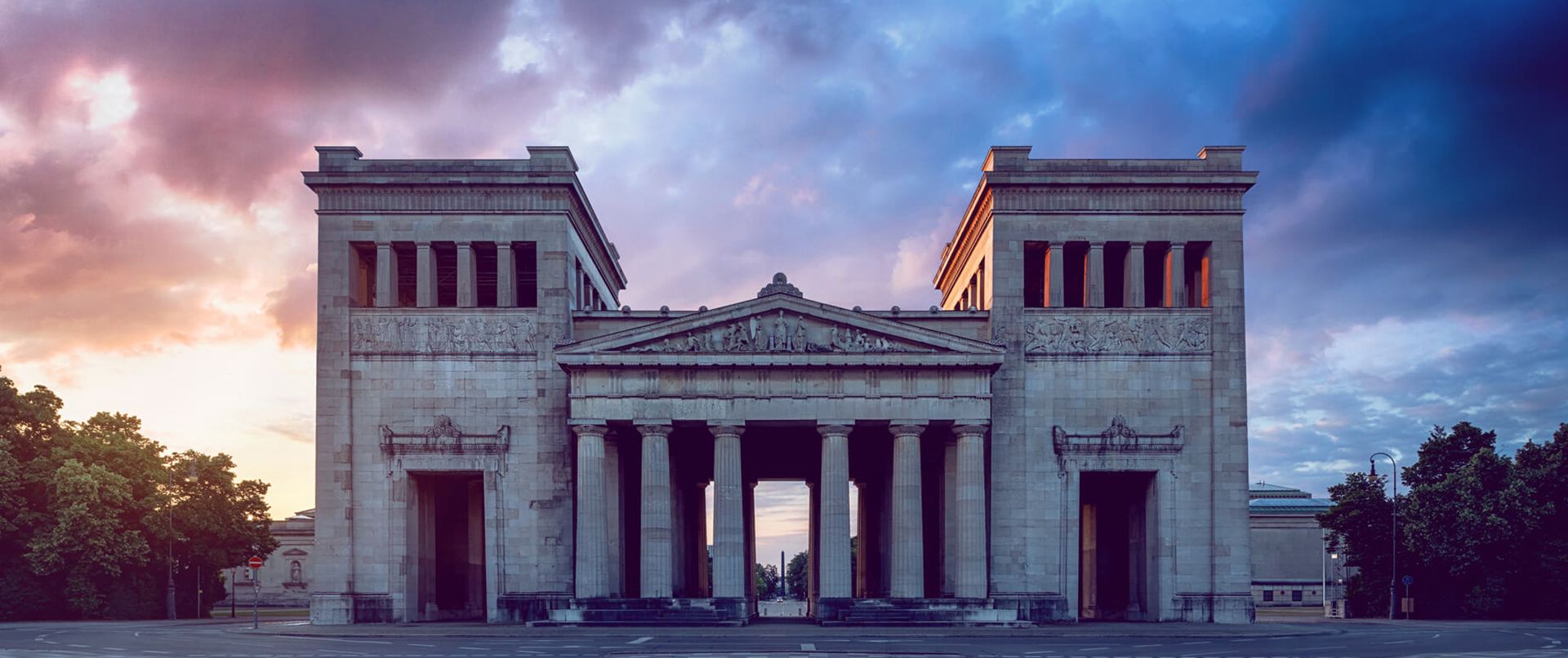 A sightseeing gate in munich at the königsplatz.