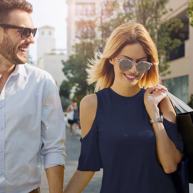 A couple with shopping-bags.